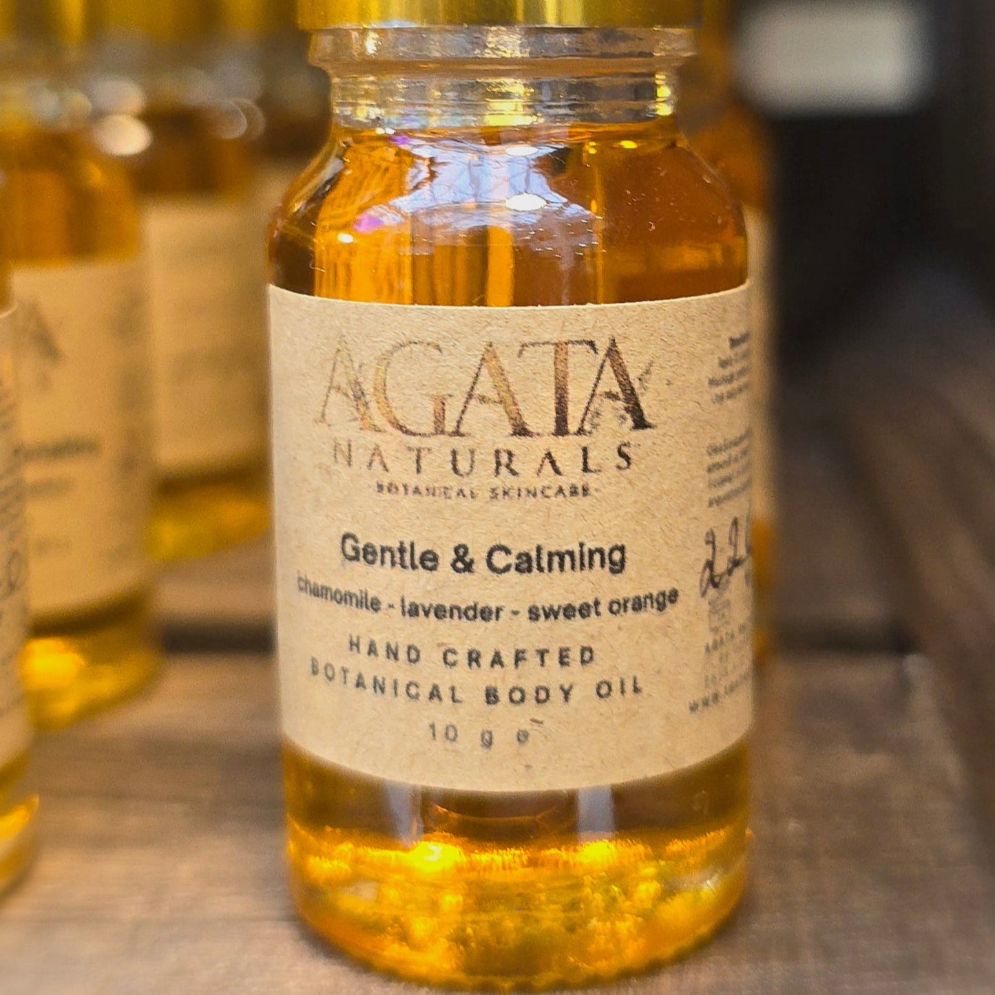 “Gentle body oil with chamomile, sweet orange, and lavender”
“Natural calming body oil for sensitive skin and children”