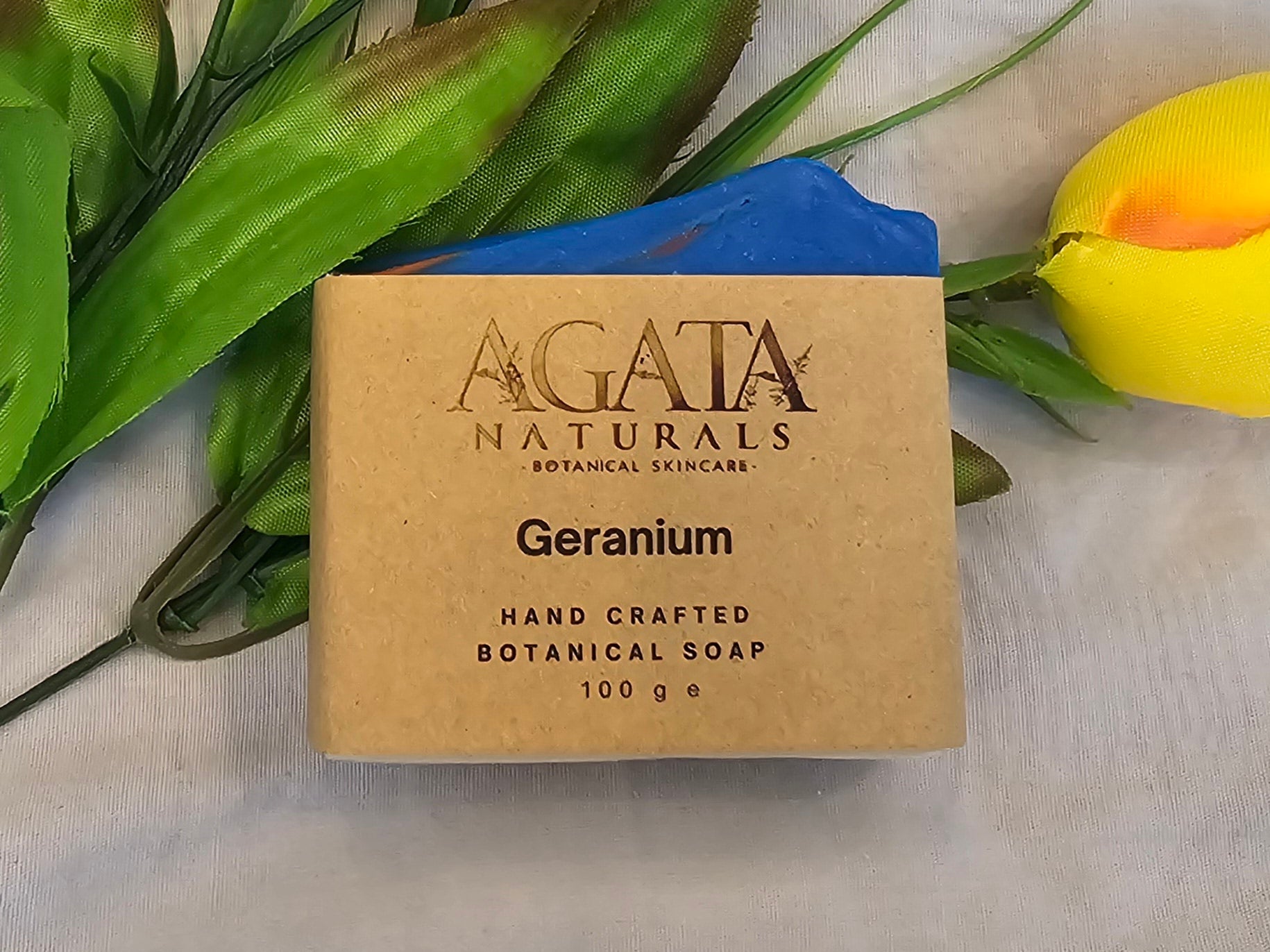 “Handmade geranium soap with blue and red mica swirl”
“Natural floral soap bar with geranium essential oil and shea butter”