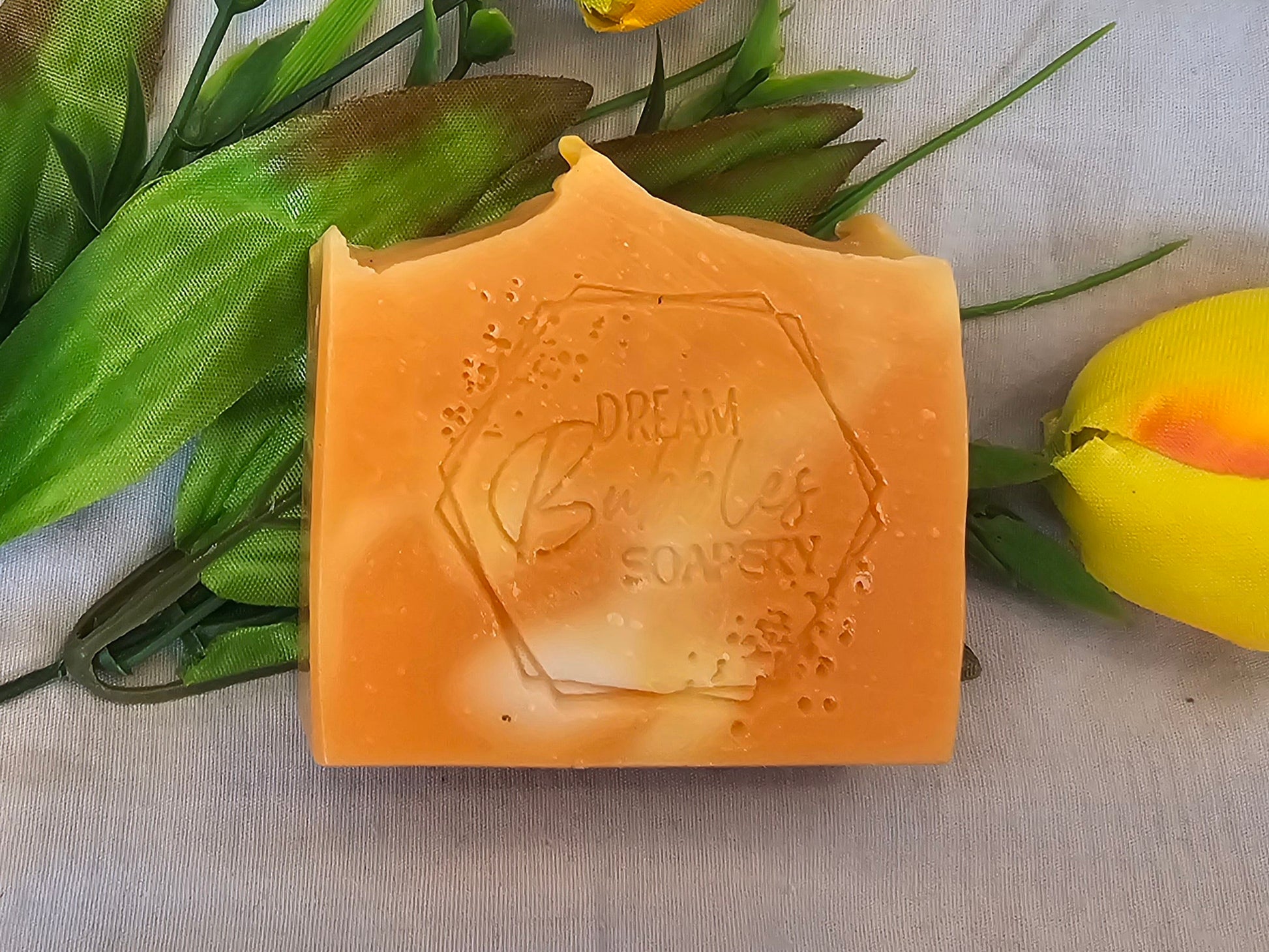 “Handmade sweet orange soap with orange mica and citrus oils”
“Citrus-scented natural soap bar with shea butter and coconut oil”