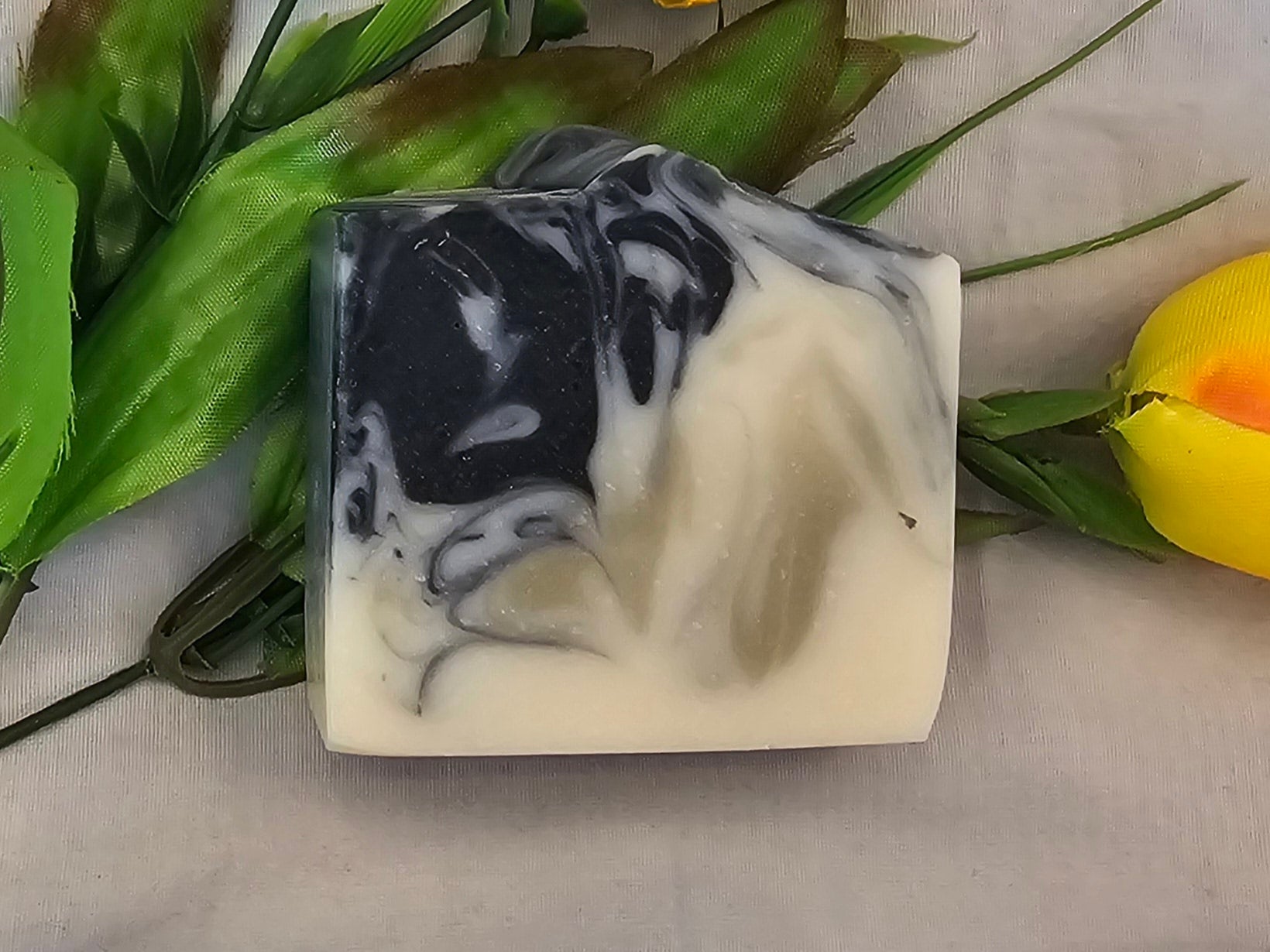 “Handmade tea tree soap with charcoal and clay for acne-prone skin”
“Detoxifying natural soap bar with tea tree oil and green clay”