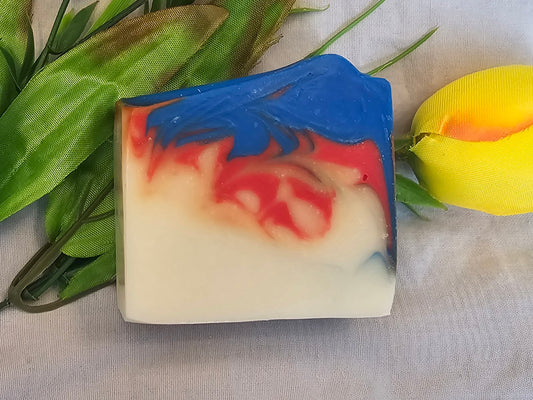 “Handmade geranium soap with blue and red mica swirl”
“Natural floral soap bar with geranium essential oil and shea butter”